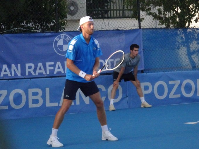 French tennis player Hugo Grenier plays on third surface, wins match in Marrakech qualifying. Two other French players also in tournament.